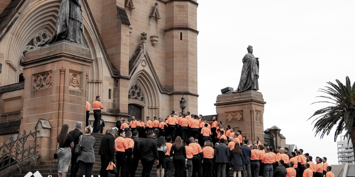 Funeral videography at St Mary’s Cathedral, with 3,000 attendees, dove release, and a cortege led by his white ute.